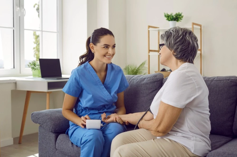Nurse in home with patient
